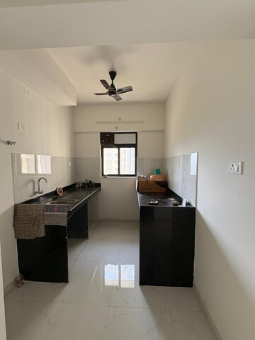 Kitchen in 1 BHK Apartment at Runwal Gardens Phase 2, Dombivli East – for Rent