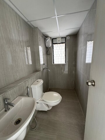 Bathroom in 3 BHK Apartment at Runwal Gardens Phase I, Dombivli East – for Sale