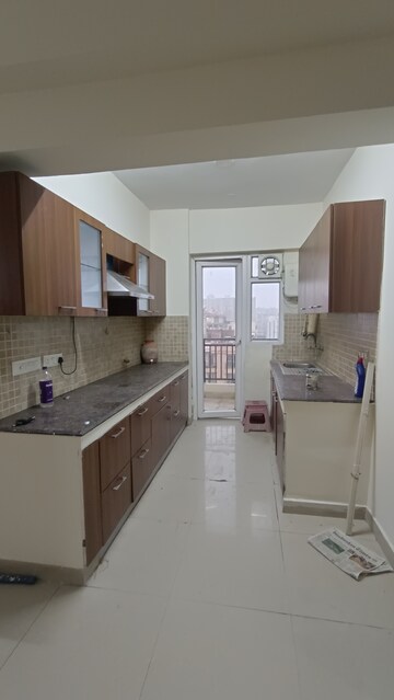 Kitchen in 2 BHK Apartment at Sethi Max Royal, Sector 76 – for Rent