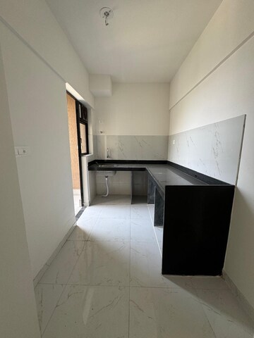 Kitchen in 2 BHK Apartment at Runwal Gardens Phase 2, Dombivli East – for Rent