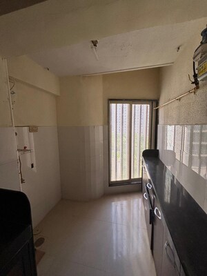 Kitchen in 3 BHK Apartment at Goregaon West View CHS, Goregaon West – for Rent