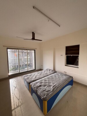 Bedroom in 3 BHK Apartment at Goregaon West View CHS, Goregaon West – for Rent