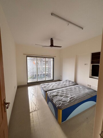 Bedroom in 3 BHK Apartment at Goregaon West View CHS, Goregaon West – for Rent
