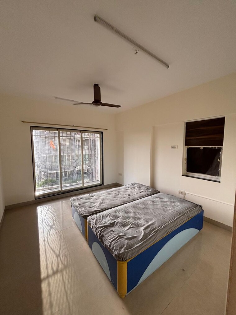Bedroom, goregaon-west-view-chs 3 Bedroom 950 Sq.Ft. Apartment In Goregaon West Mumbai 9291960