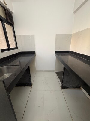 Kitchen in 1 BHK Apartment at Runwal Gardens Phase I, Dombivli East – for Rent