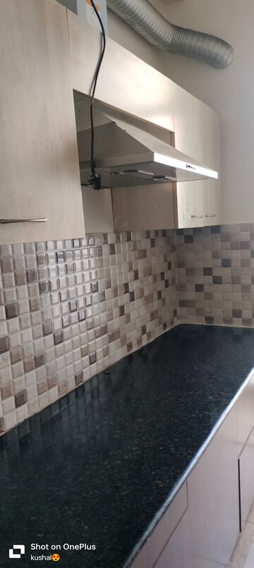 Kitchen in 2 BHK Apartment at Kiara Residency, Sushant Golf City – for Rent