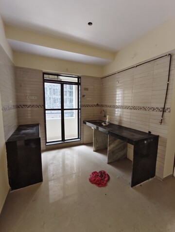 Kitchen in 2 BHK Apartment at Ravi Gaurav Samruddhi, Mira Road East – for Sale