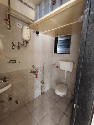 Bathroom in 1 BHK Apartment at Ravi Gaurav Samruddhi, Mira Road East – for Sale