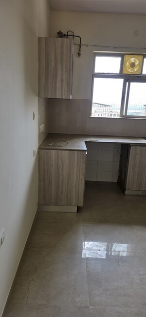 Kitchen in 3 BHK Apartment at Hiranandani Estate Rodas Enclave, Ghodbunder Road – for Rent