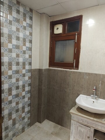 Bathroom in 4 BHK Apartment at Emaar MGF The Palm Drive Studios, Sector 66 – for Sale
