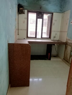 Kitchen in 1 BHK Apartment at Riddhi Garden, Malad East – for Sale