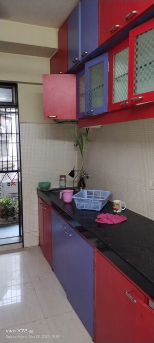 Kitchen in 2 BHK Apartment at Globe Heights, Goregaon East – for Sale
