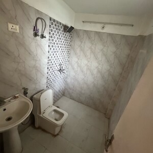 Bathroom in 2.5 BHK Apartment at Nirala Aspire, Panchsheel Green – for Sale