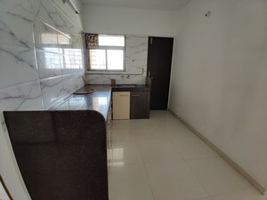 Kitchen in 2 BHK Apartment at Geeta Gold Fusion, Kharadi – for Rent