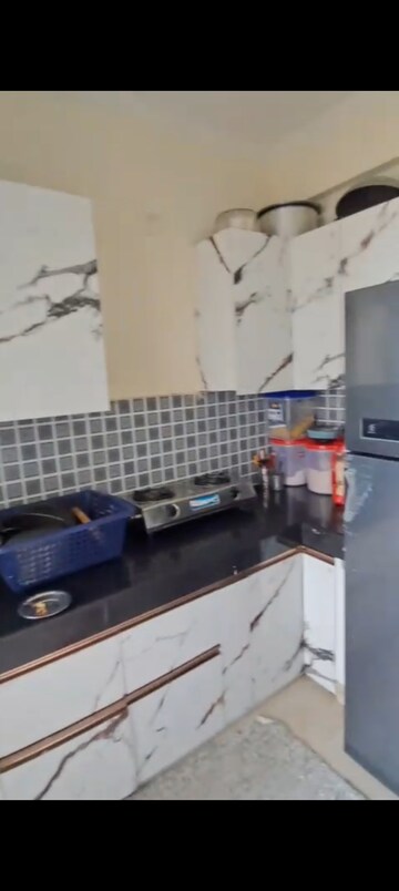 Kitchen in 2 BHK Apartment at Nilaya Greens, Raj Nagar Extension – for Sale