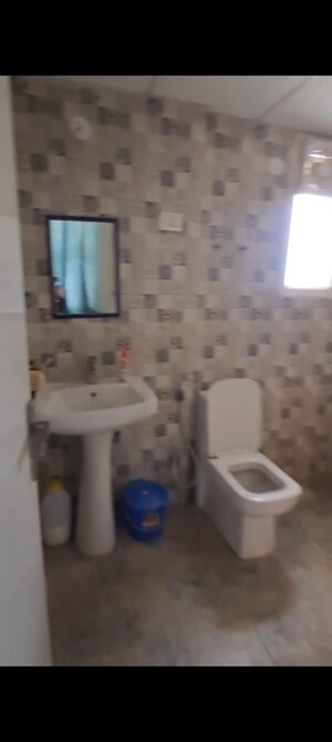 Bathroom in 2 BHK Apartment at Nilaya Greens, Raj Nagar Extension – for Sale