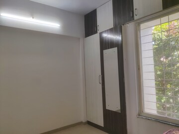Room in 2 BHK Apartment at Spandan Sparsh CHS, Wagholi – for Rent