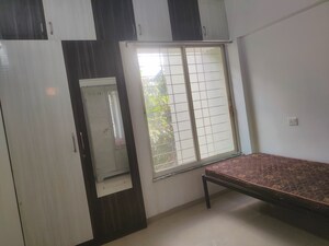 Room in 2 BHK Apartment at Spandan Sparsh CHS, Wagholi – for Rent
