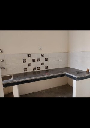 Kitchen in 1 BHK Apartment at Eureka Diya Green City, Raj Nagar Extension – for Sale
