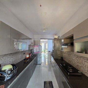 Kitchen in 5 BHK Apartment at Transcon Triumph Tower, Veera Desai Industrial Estate – for Rent