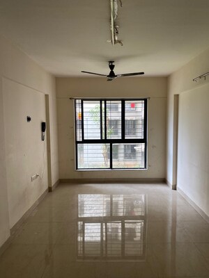 Living Room in 1 BHK Apartment at Lodha Crown Taloja Quality Homes, Dombivli East – for Sale