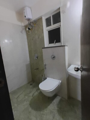 Bathroom in 2 BHK Apartment at Mantra Insignia, Mundhwa – for Rent