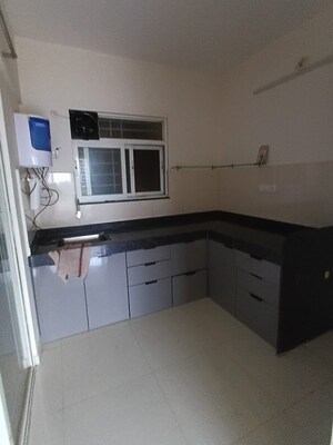 Kitchen in 2 BHK Apartment at Mantra Insignia, Mundhwa – for Rent