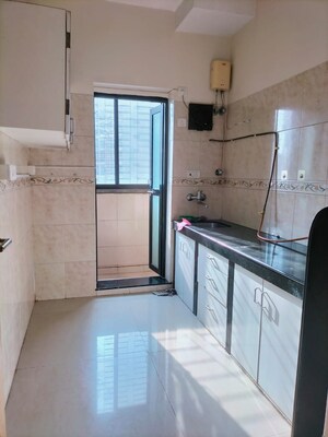 Kitchen in 1 BHK Apartment at K Raheja Heights, Malad East – for Rent
