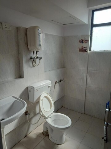 Bathroom in 2 BHK Apartment at OP Floridaa, Sector 82 – for Rent