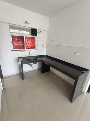 Kitchen in 1 BHK Apartment at Mantra Insignia, Mundhwa – for Rent