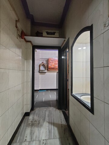 Building Lobby in 2 BHK Apartment at Vastu Anand Apartment, Kalwa – for Rent