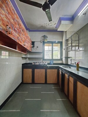Kitchen in 2 BHK Apartment at Vastu Anand Apartment, Kalwa – for Rent