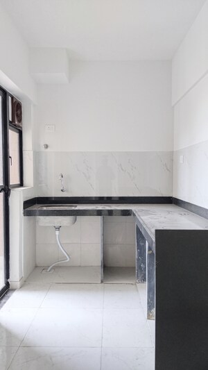 Kitchen in 2 BHK Apartment at Runwal Gardens Phase 2, Dombivli East – for Sale