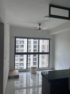 Living Room in 1 BHK Apartment at Lodha Crown Quality Homes, Majiwada – for Rent