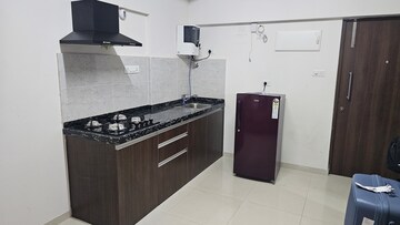 Kitchen in Studio Apartment at Gera World of Joy, Kharadi – for Rent