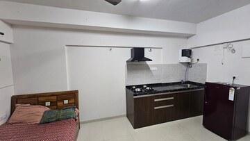 Kitchen in Studio Apartment at Gera World of Joy, Kharadi – for Rent