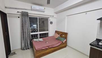 Bedroom in Studio Apartment at Gera World of Joy, Kharadi – for Rent