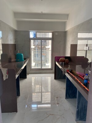 Kitchen in 2 BHK Apartment at Moongipa Pushkar Niketan, Andheri West – for Sale