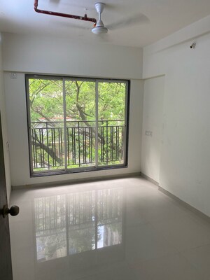 Room in 2 BHK Apartment at Moongipa Pushkar Niketan, Andheri West – for Sale