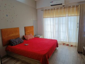 Bedroom in 1 BHK Apartment at Paramount Golfforeste, Zeta I Greater Noida – for Rent