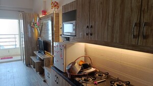 Living Room in 1 BHK Apartment at Paramount Golfforeste, Zeta I Greater Noida – for Rent