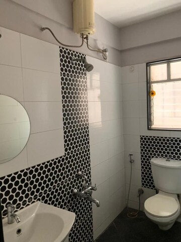 Bathroom in 3 BHK Apartment at Swiss County, Thergaon – for Sale