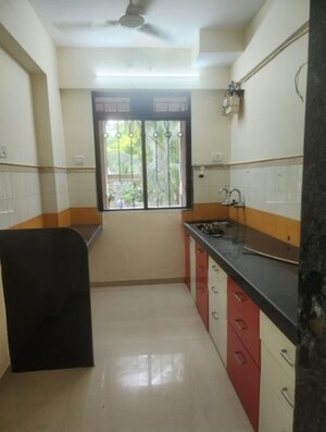 Kitchen in 2 BHK Apartment at Lodha Paradise, Majiwada – for Rent