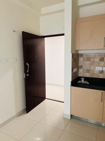 Kitchen in 1 BHK Apartment at Puravankara Silversands, Mundhwa – for Rent