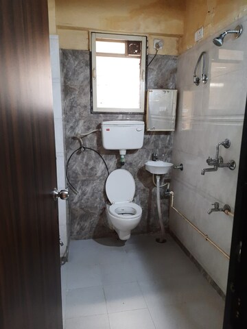 Bathroom in 1 BHK Apartment at Haware Palms, Muthaval – for Rent