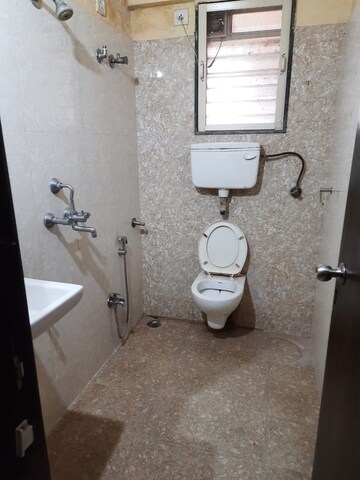 Bathroom in 1 BHK Apartment at Haware Palms, Muthaval – for Rent