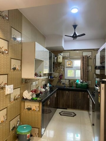 Kitchen in 2 BHK Apartment at Amrapali Golf Homes, Sector 4 Greater Noida – for Rent