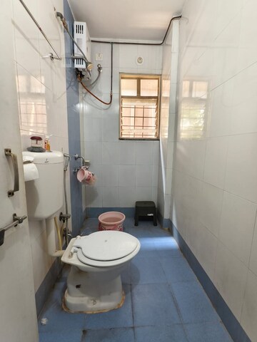 Bathroom in 2 BHK Apartment at Amey River View , Anand Nagar – for Sale