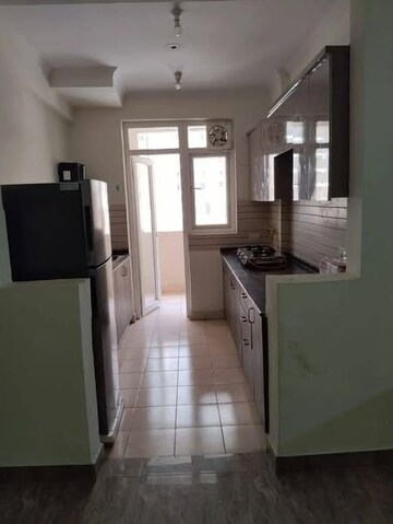 Kitchen in 2 BHK Apartment at Amrapali Golf Homes, Sector 4 Greater Noida – for Rent