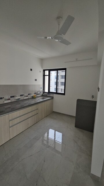Kitchen in 3 BHK Apartment at Unique Youtopia, Kharadi – for Rent